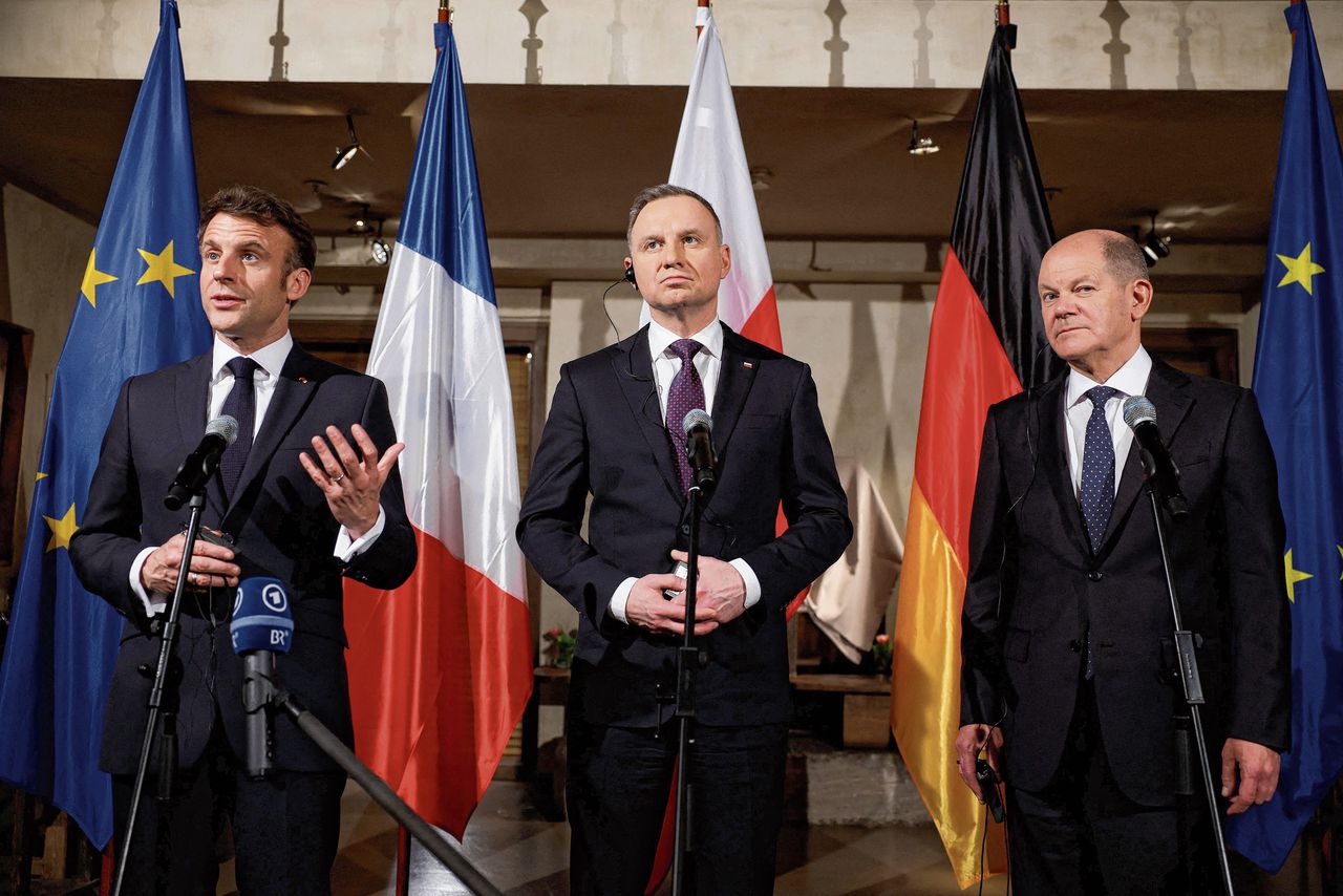 De Franse president Macron, de Poolse president Duda en de Duitse kanselier Scholz vrijdag in München.