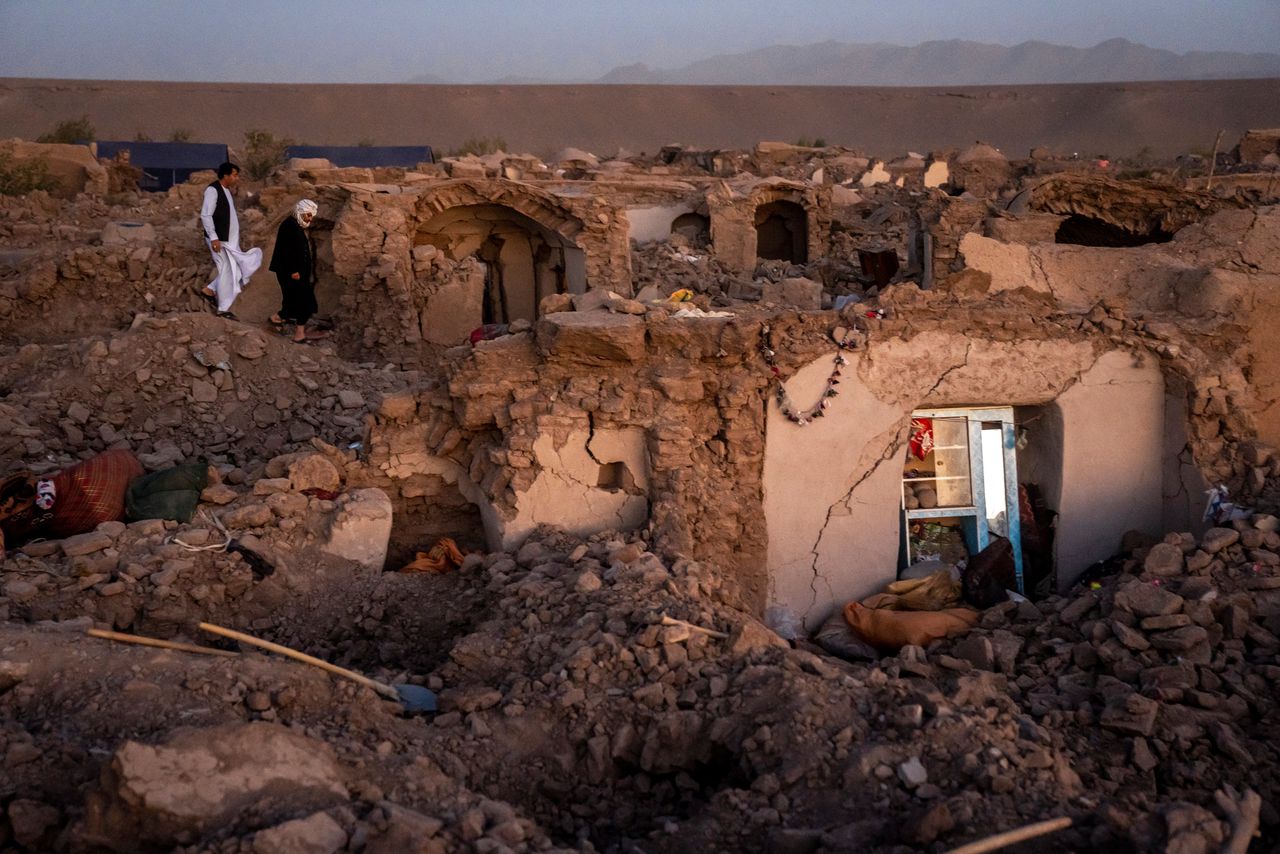 Afghan men search for victims after an earthquake in Zenda Jan district in Herat province, of western Afghanistan, Sunday, Oct. 8, 2023. Powerful earthquakes killed at least 2,000 people in western Afghanistan, a Taliban government spokesman said Sunday. It's one of the deadliest earthquakes to strike the country in two decades.