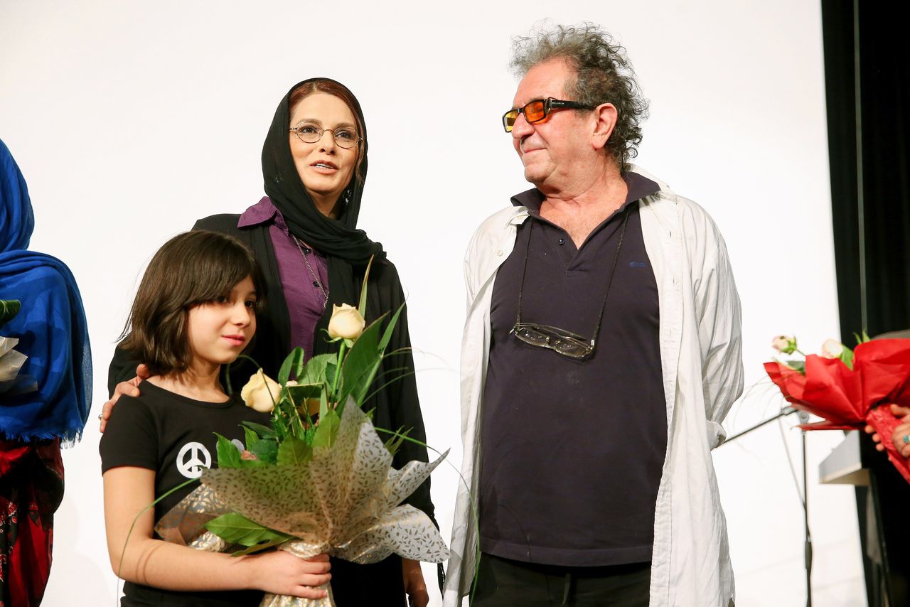 De Iraanse filmregisseur Dariush Mehrjui, zijn vrouw Vahideh Mohammadifar en hun dochter Mona in Teheran, Iran, in 2013.