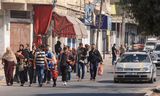 Palestijnse families uit Gaza-Stad slaan op de vlucht na de oproep tot evacuatie door Israël.