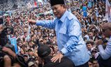 De omstreden presidentskandidaat en huidige minister van Defensie Prabowo Subianto tijdens een campagnebijeenkomst afgelopen zaterdag in het Gelora Bung Karno-stadion in Jakarta.