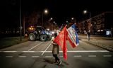 Een boerendemonstrant eind vorig jaar bij het Provinciehuis van Noord-Brabant.