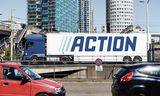 Vrachtwagen van winkelketen Action in Den Haag op weg naar een filiaal om te bevoorraden.  