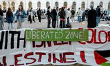 Pro-Palestijnse demonstranten bij de universiteitsbibliotheek in Utrecht.  