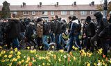 Rick Houterman (24), hier tussen de fans, bezoekt alle thuis- en uitwedstrijden.