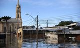 Ondergelopen huizen in de wijk Rio Branco, in Canoas, in de zuidelijke Braziliaanse deelstaat Rio Grande do Sul. Ruim 600.000 mensen zijn voor het hoge water op de vlucht. 