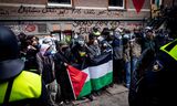 Pro-Palestinademonstranten begin deze maand op het Binnengasthuisterrein van de Universiteit van Amsterdam. 