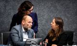 Debat in de gemeenteraad over het Haga Lyceum in 2019,  rechts Marjolein Moorman (wethouder Onderwijs, PvdA), achter Rutger Groot Wassink burgemeester Femke Halsema.