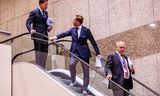 Van links naar rechts: premier Mark Rutte,  vicepremier Hugo de Jonge (VWS) en secretaris-generaal AZ Gert-Jan Buitendijk