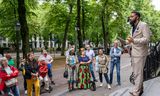 Oprichter van studentenvereniging Tribez Rudy van der Beek, één van de vertellers  tijdens de Keti Koti-wandeling van Het Nationale Theater in 2023.