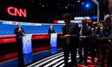 Trump (links) en Biden, afgelopen donderdag tijdens hun eerste tv-debat, uitgezonden door CNN. 