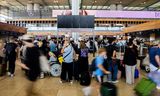 Berlin Brandenburg Airport.  Onder meer in Berlijn, Madrid, Edinburgh, Sydney, Tokio en Mumbai hebben luchthavens last van de storing. Hoeveel vluchten er vandaag wel of niet kunnen doorgaan, is nog niet duidelijk. 