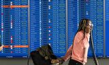 Vertragingen en gecancelde vluchten op Dulles International Airport, Virginia (VS). Foto ROBERTO SCHMIDT 