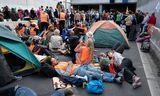 Demonstranten van Extinction Rebellion (XR) tijdens een blokkade van de A12. 