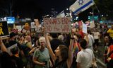 Israëlische demonstranten in Tel Aviv op donderdag. Een bordje met: ‘het einde van Sinwar leidt tot het einde van de oorlog’. 