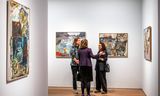 Bezoekers tijdens de opening van de tentoonstelling  100XLucebert. 