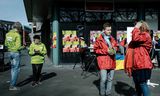 Leden van PvdA en GroenLinks in 2022 samen op campagne in Ridderkerk. 