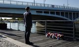 De Franse president Macron, zaterdag, tijdens de 60ste herdenking van het bloedige optreden van Franse autoriteiten tegen Algerijnen in Parijs, in 1961.