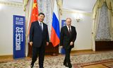 De Chinese president Xi Jinping en zijn Russische ambtgenoot Vladimir Poetin dinsdag bij het begin van de BRICS-top in het Russische Kazan. 