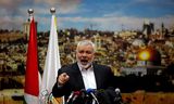 Hamas-leider Ismail Haniyeh tijdens een toespraak in 2017, met op de achtergrond een foto van Jeruzalem. Hij reageerde op de beslissing van de toenmalige Amerikaanse president Donald Trump om Jeruzalem als de hoofdstad van Israël te erkennen.   