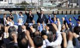 Premier Shigeru Ishiba (rechts van de man met microfoon) tijdens een campagnebijeenkomst in Fukushima. 