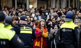 Pro-Palestijnse demonstranten op de Dam op zondagmiddag.