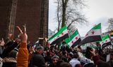 Syrische inwoners van Utrecht vieren de ondergang van het Assad-regime, op 8 december.