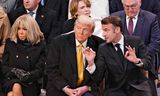 Ceremonie bij de heropening van Notre-Dame in Parijs, zaterdag 7 december. Daags na de verwoestende brand in april 2019 beloofde Macron al dat de kerk binnen vijf jaar zou worden herbouwd.   Foto Ludovic MARIN / POOL / AFP  