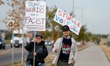 Demonstranten bij een verkiezingsbijeenkomst van Trump in Aurora, Colorado, 11 oktober.   