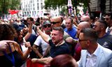 Stephen Yaxley-Lennon, ook bekend als Tommy Robinson, is oprichter en voormalige leider van de extreem-rechtse en anti-islamitische organisatie English Defence League (EDL). Hier is hij aanwezig bij een mars met aanhangers in Londen, op 27 juli. 