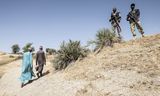 De  Hausa-boerengemeenschap in Nigeria betaalt elke maand 30.000 Naira (ongeveer 18 euro) om deze mannen hun boerderijen en mensen te laten beschermen.Simon Townsley/Panos Pictures 