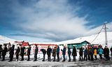 Groenlanders staan op 6 april in de rij om te stemmen voor het  parlement in de hoofdstad Nuuk. Groenland beschikt sinds 1979 over zelfbestuur.