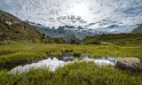 Terugtrekkende gletsjers staan in de Alpen symbool voor klimaatverandering, maar de opwarming daar stelt bergsporters ook voor veel nieuwe gevaren.