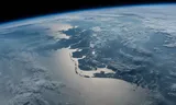 Zicht op Nederland vanuit het internationale ruimtestation ISS.