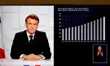 Een screenshot van president Macron tijdens zijn toespraak woensdagavond. Foto by Ludovic MARIN / AFP