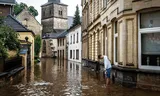 Valkenburg na   het buiten haar oevers treden van de Geul in juli 2021. Duizenden huizen kwamen  onder water  te staan. 