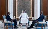 President Felix Tshisekedi  van Congo (r.) en president Paul Kagame van Rwanda tijdens hun ontmoeting met emir Sheikh Tamim bin Hamad Al Thani in Doha, Qatar. 