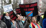 Deelnemers aan de protestmars in Den Haag eisen het einde van de Rwandese bezetting in Congo. Foto Giel Bonte 