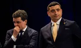 De Roemeense presidentskandidaten Nicusor Dan (links) en George Simion tijdens een debat in Boekarest. Foto Andreea Alexandru/AP
