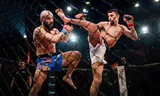 MMA-vechter Harun Kurt uit Duitsland (links) in gevecht met Barry Irausquin uit Curaçao. 