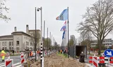 Bij het World Forum in Den Haag, waar over twee maanden de NAVO-top wordt gehouden, hangen de komende maanden de vlaggen van de 32 lidstaten. Foto Walter Herfst  