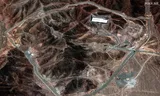 Satellietfoto, gemaakt op 14 juni, van de Iraanse verrijkingsfabriek bij het dorp Fordow, die zo’n honderd meter onder de grond ligt ter beveiliging tegen bombardementen. 