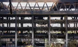 Het verwoeste gebouw van de Iraanse staatsomroep (IRIB) in Teheran, nadat het een paar dagen eerder was getroffen door een Israëlische aanval. 