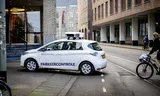 Medewerkers van handhaving rijden op straat in Den Haag met scanauto’s rond, die controleren of er betaald is voor het parkeren. Foto Robin Utrecht/ANP 