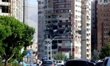 Een gebouw in de Iraanse hoofdstad Teheran werd vrijdagochtend zwaar beschadigd bij de Israëlische aanval. Foto Atta Kenare/AFP