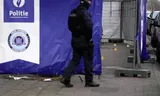 Een agent dinsdag na de dodelijke schietpartij in Merksem, Antwerpen.