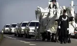 Begrafenis van Piet, Ria en Sjef Verhagen, 2000. 