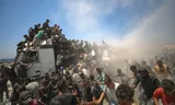 ‘Elke dag is een stroom vrachtwagens nodig’: hulporganisaties kritisch over voedseldroppings boven Gaza