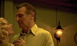 Philip Marlowe (Liam Neeson) doorziet ‘femme fatale’ Clare (Diane Kruger) meteen, in ‘Marlowe’.