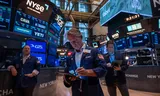 Beleggers op de vloer van de New York Stock Exchange. Foto Spencer Platt/AFP/Getty Images 